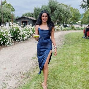 Sleek navy satin dress with strappy back